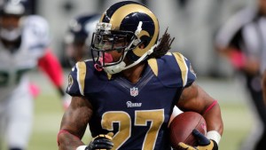 Oct 19, 2014; St. Louis, MO, USA; St. Louis Rams running back Tre Mason (27) carries the ball during the first half of a football game at the Edward Jones Dome. Mandatory Credit: Scott Kane-USA TODAY Sports